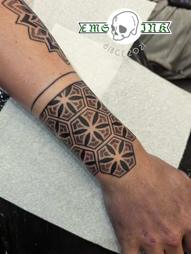 Black and grey tattoo by Em Louise