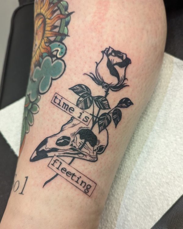 Black and grey tattoo by Em Louise