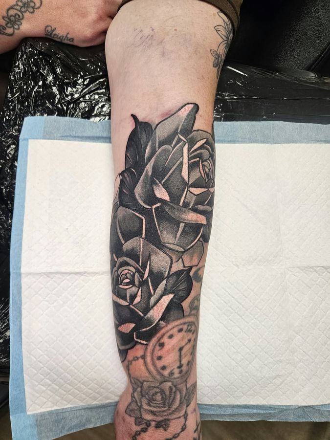 Black and grey tattoo by Wayne Goodwin