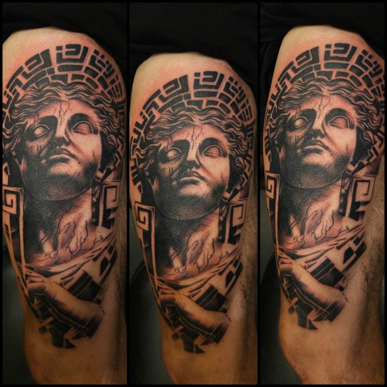 Black and grey tattoo by Wayne Goodwin