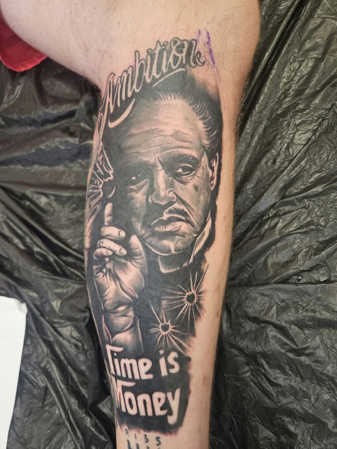 Black and grey tattoo by Wayne Goodwin