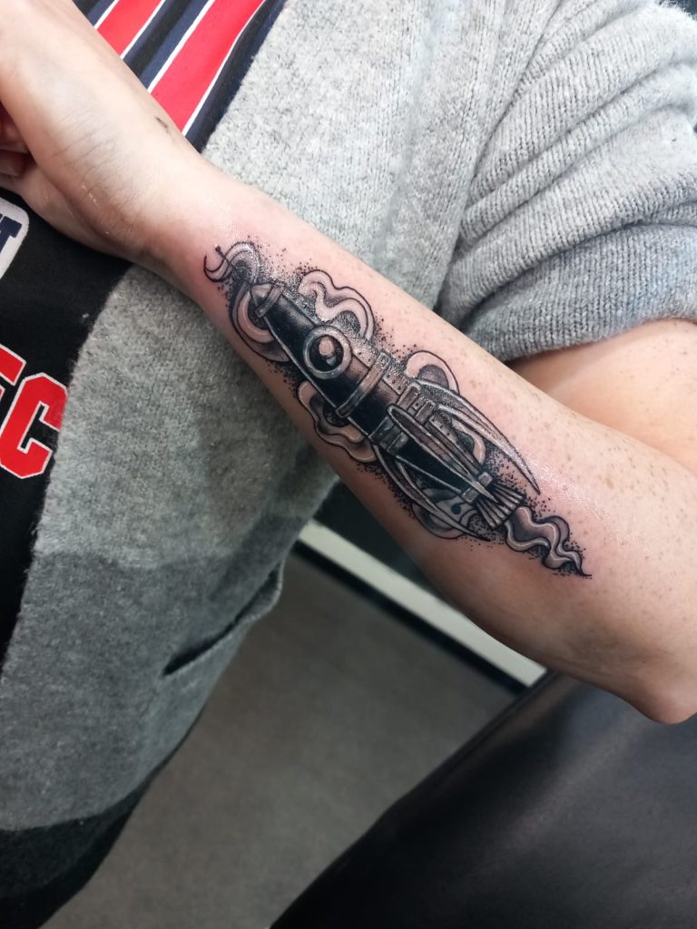 Black and grey tattoo by Leah Lillian