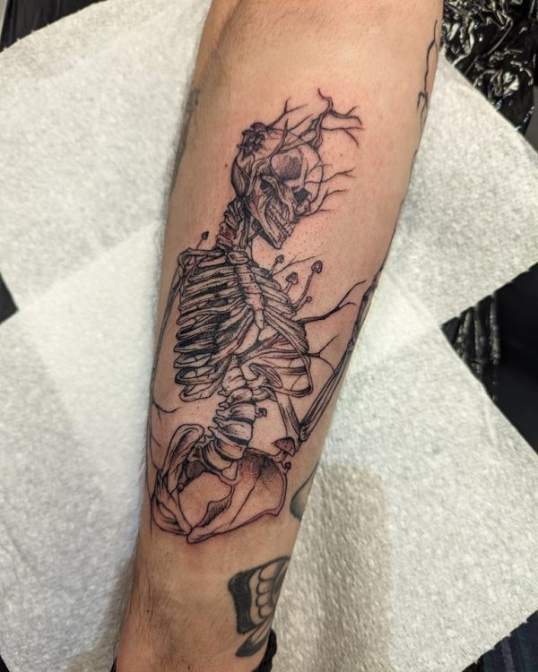 Black and grey tattoo by Em Louise