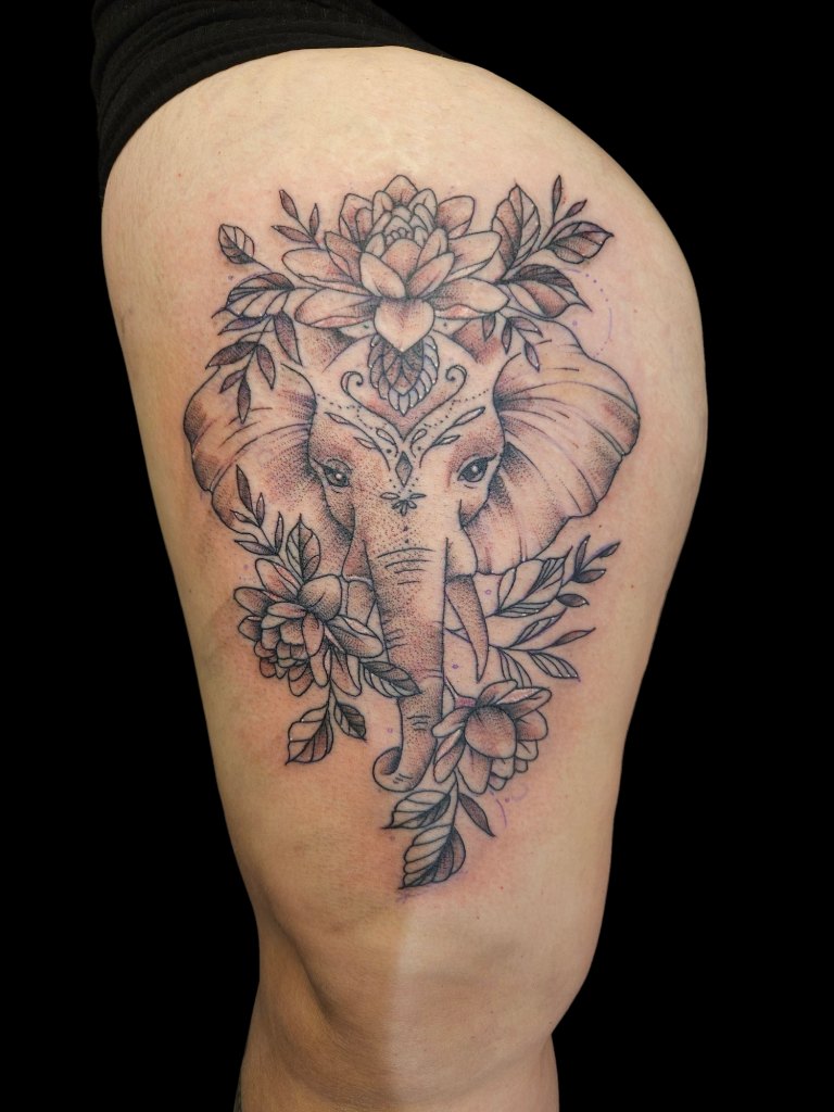 Black and grey tattoo by Wayne Goodwin