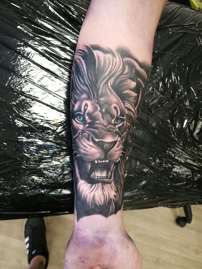 Black and grey tattoo by Wayne Goodwin