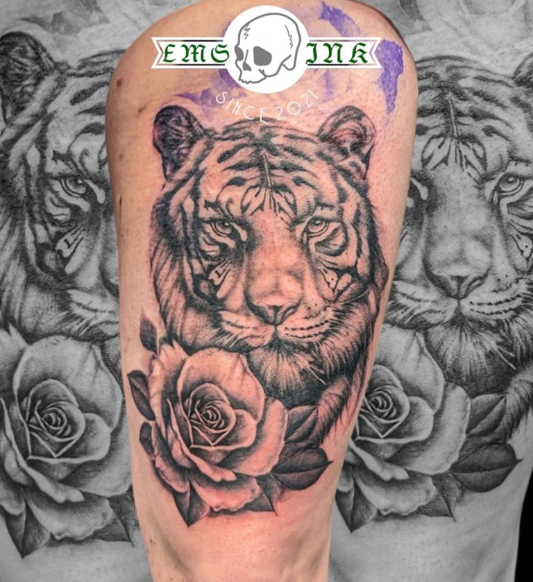 Black and grey tattoo by Em Louise