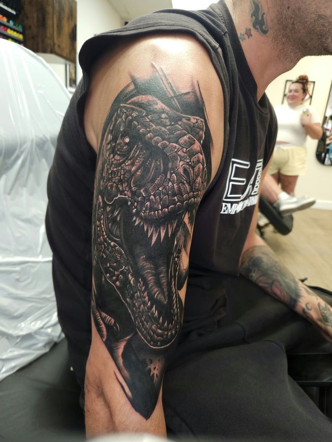 Black and grey tattoo by Wayne Goodwin