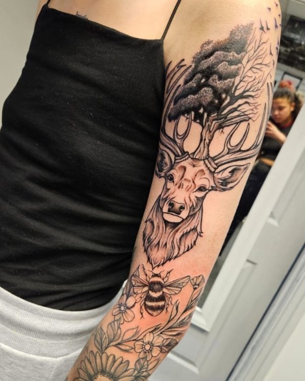 Black and grey tattoo by Leah Lillian