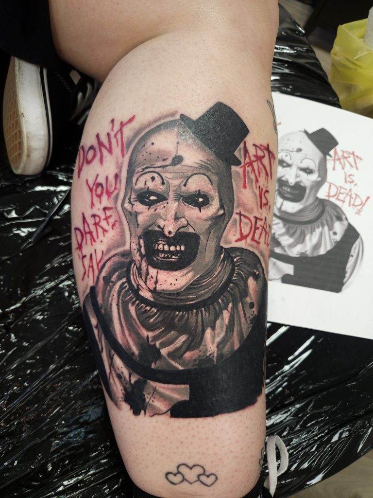 Black and grey tattoo by Wayne Goodwin